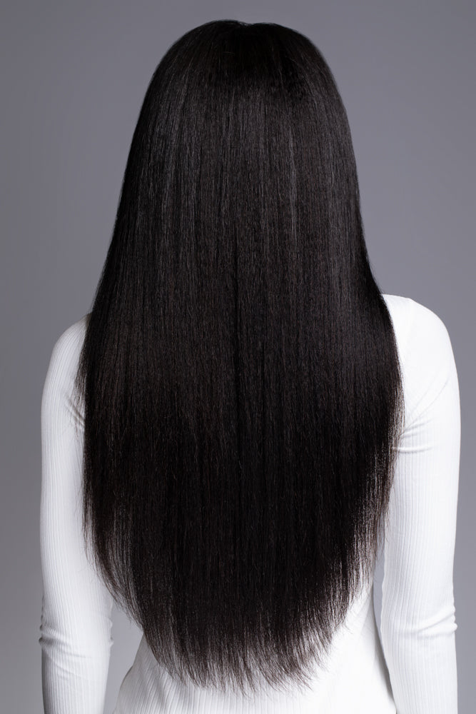 Close-up of kinky straight virgin human hair texture on U-part wig for natural blending