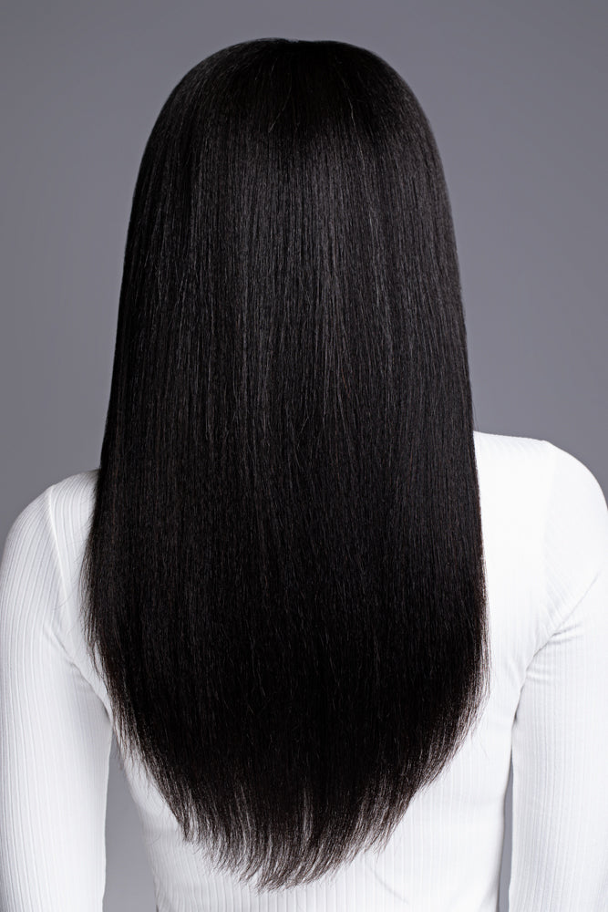 Back view of kinky straight virgin human hair U-part wig showing fullness and natural movement